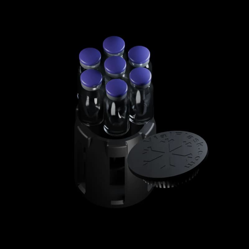 Seven glass vials aligned above their individual wells in the VialFlask insert, with its snap-in top to one side